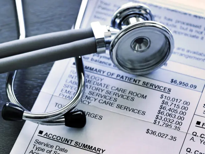 Stethoscope and medical bill