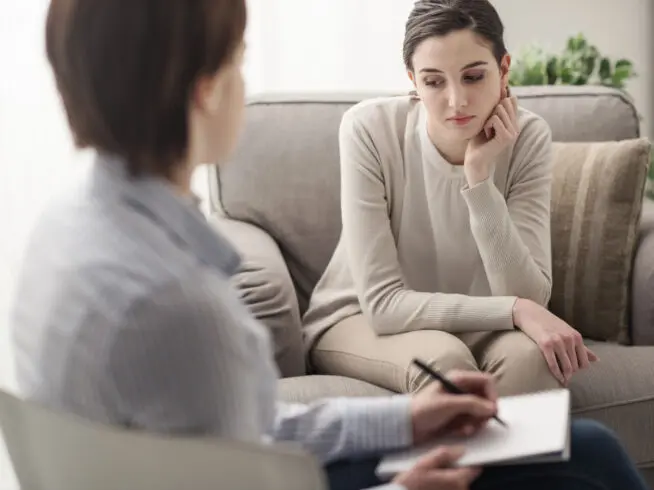 Young patient talking with a therapist.